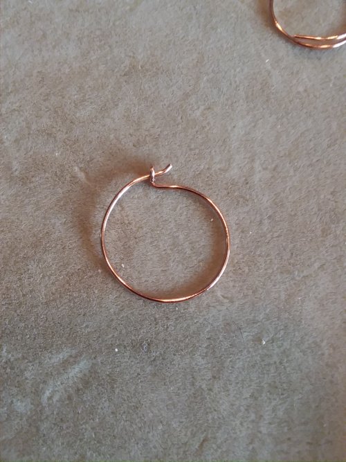 Jennifer VanBenschoten's Easy Hammered Hoop Earrings - , Contemporary Wire Jewelry, Forging, Forging Jewelry, Jewelry Forging, hook the end into the tiny loop